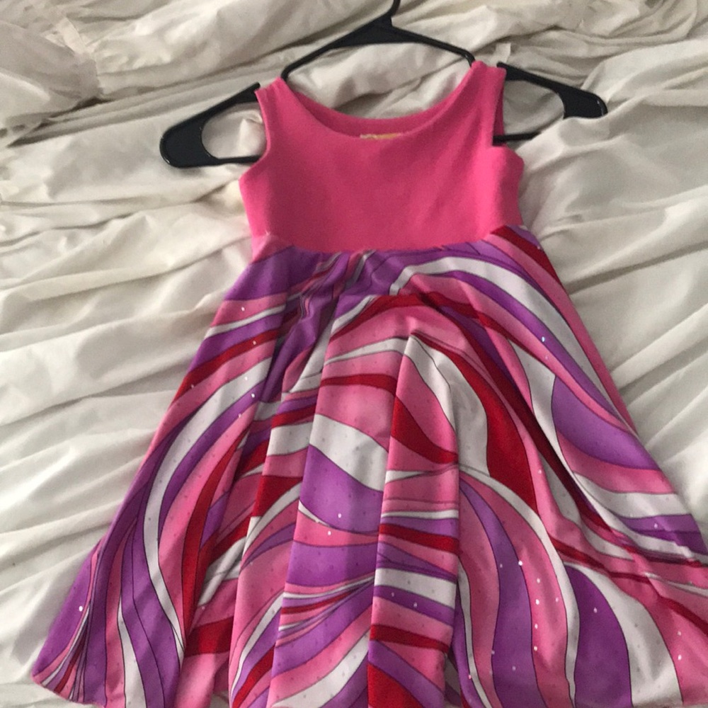 Spinning tails dress with switchable sides